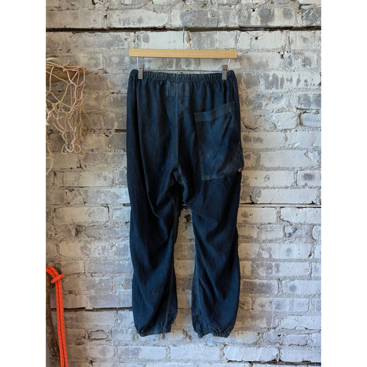 Women's Freecity Airjump Pant in matte satin with flap and snap details, featuring Moonshrooms pattern, relaxed fit and stylish design.