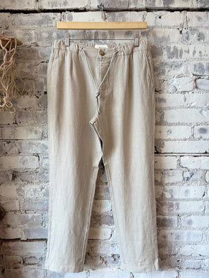 Men's Vigo tapered linen pants in mud grey by Closed Men's, featuring a relaxed fit and tapered leg style.