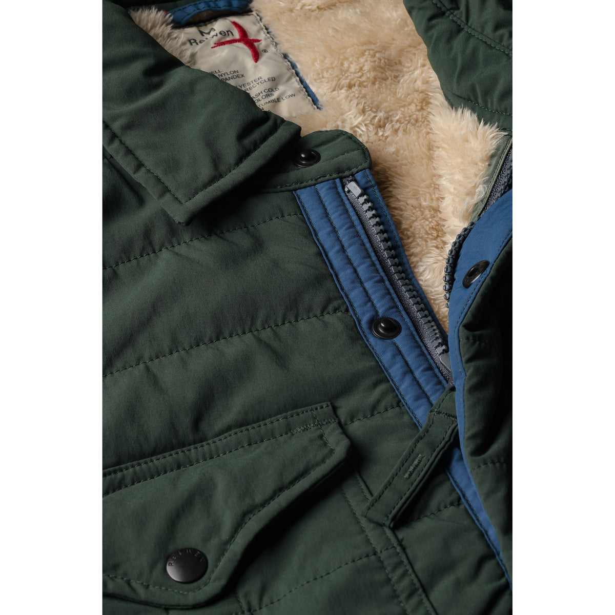 Men's Relwen Superfleece Jacket in Dark Forest, close-up view showing the soft fleece fabric and full zipper.