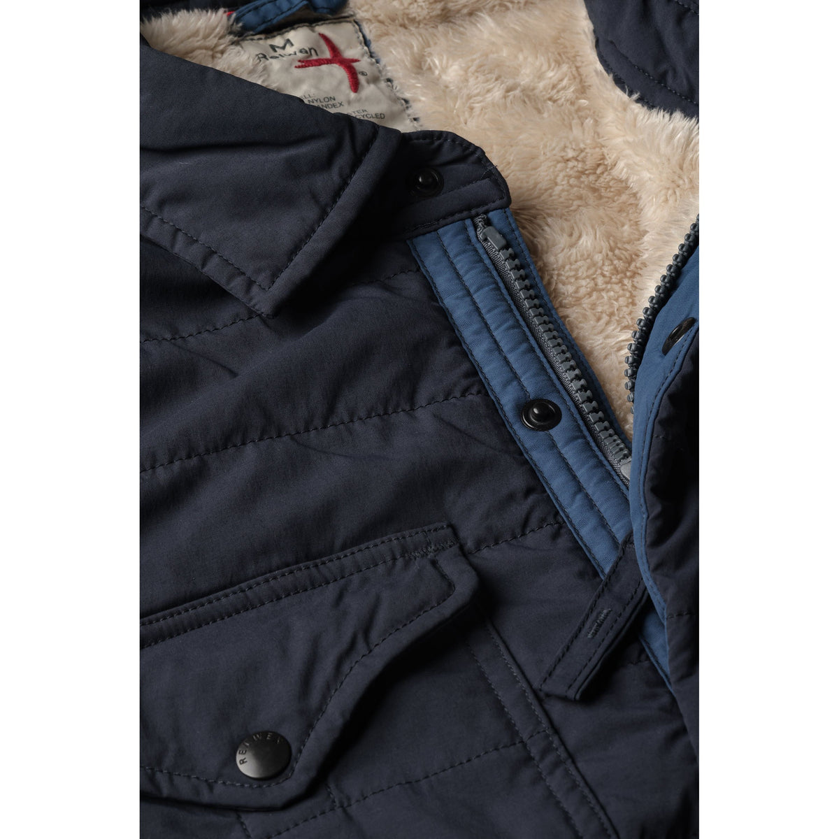 Men's navy Superfleece jacket by Relwen featuring a cozy fleece texture and a casual fit, shown on a hanger.