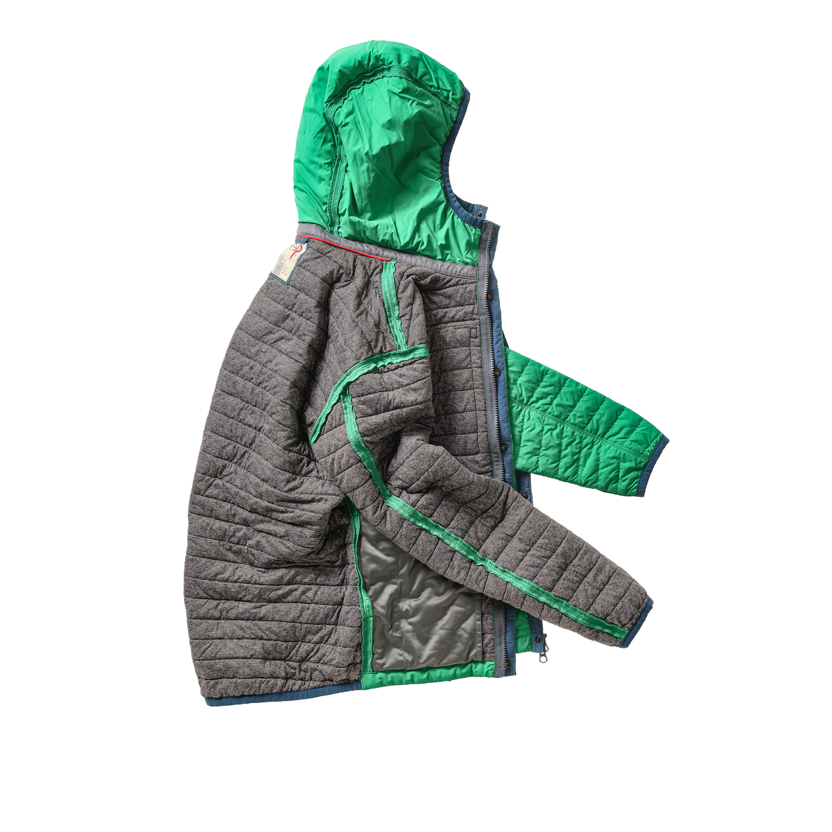 Men's Kelly Green Windzip Hood jacket by Relwen, shown in a close-up image highlighting the zip-up design and fabric texture.