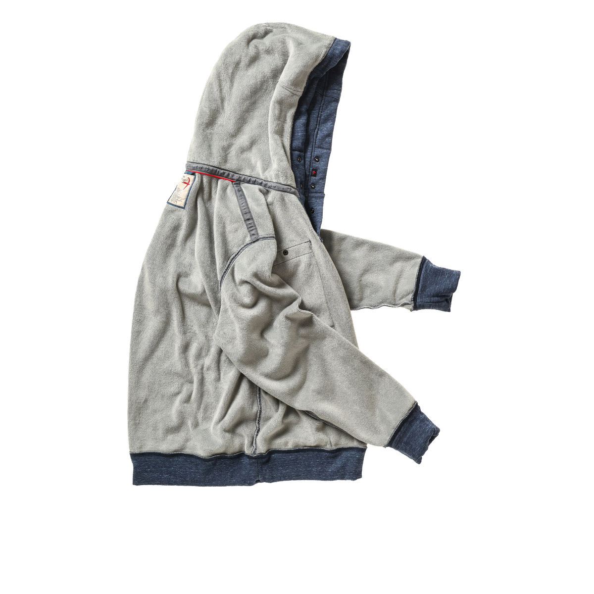 Men's navy speckled Micropile Hoodie by Relwen, showing the comfortable pullover with textured fabric and hood detail.