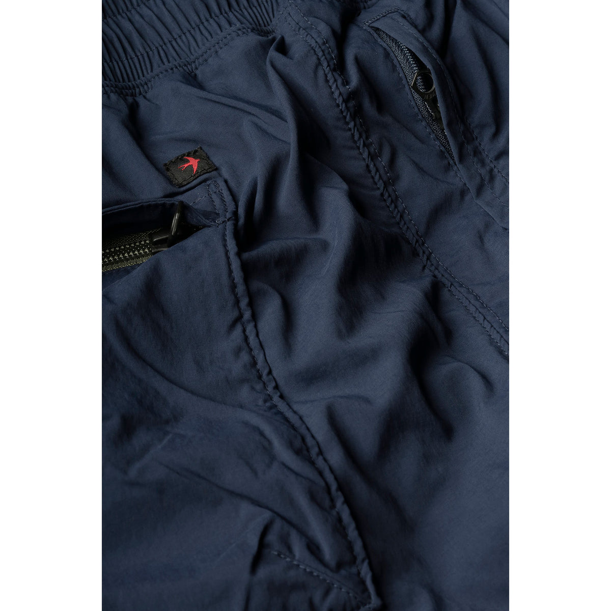 Men's Off-Trail Windpant in Bright Navy by Relwen, lightweight outdoor pants with a relaxed fit and wind-resistant fabric.