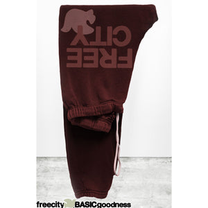 Women's Superfluff Lux OG Sweatpant in Rusty Rabbit by Freecity, featuring soft, cozy fabric and relaxed fit in a warm rust color.