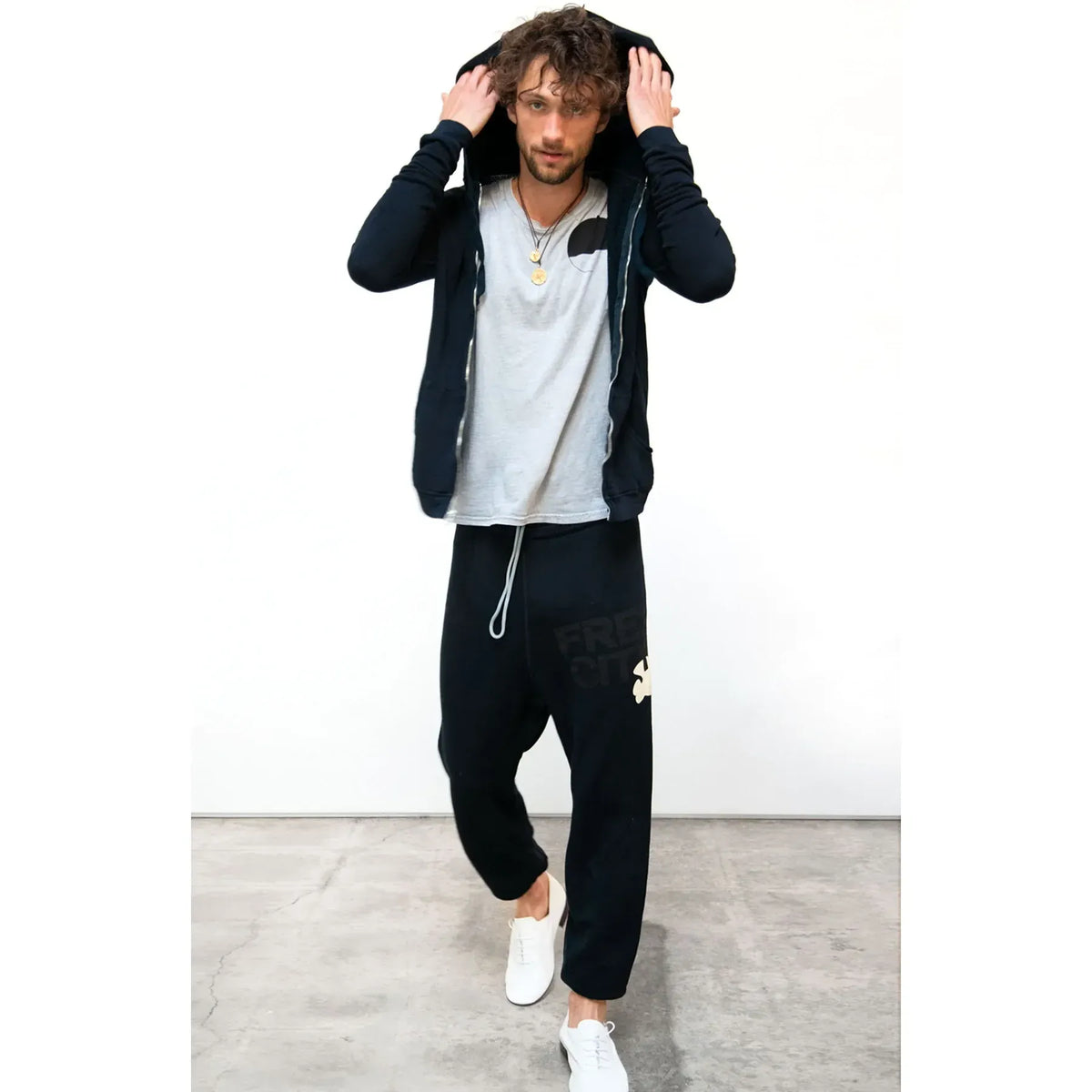 Women's SUPERFLUFF LUX zip hoodie by Freecity in Deepspace and Cream, showing the soft fleece material and relaxed fit.