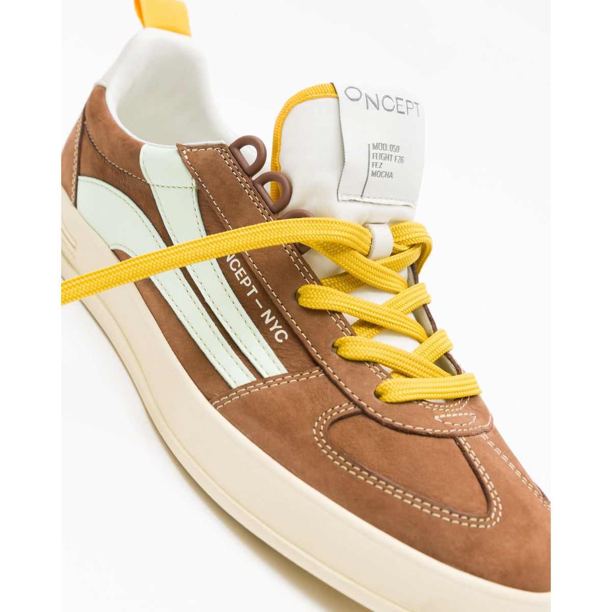 Men's Fez Mocha sneaker by Oncept, featuring soft mocha-colored leather and casual athletic design, shown from a side angle.