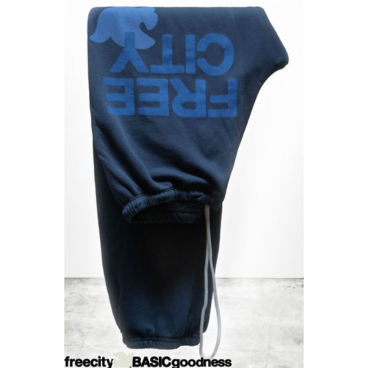 Women's Freecity large sweatpant in Moonshrooms Blue, showcasing relaxed fit and cozy fabric with moon and shroom print design.