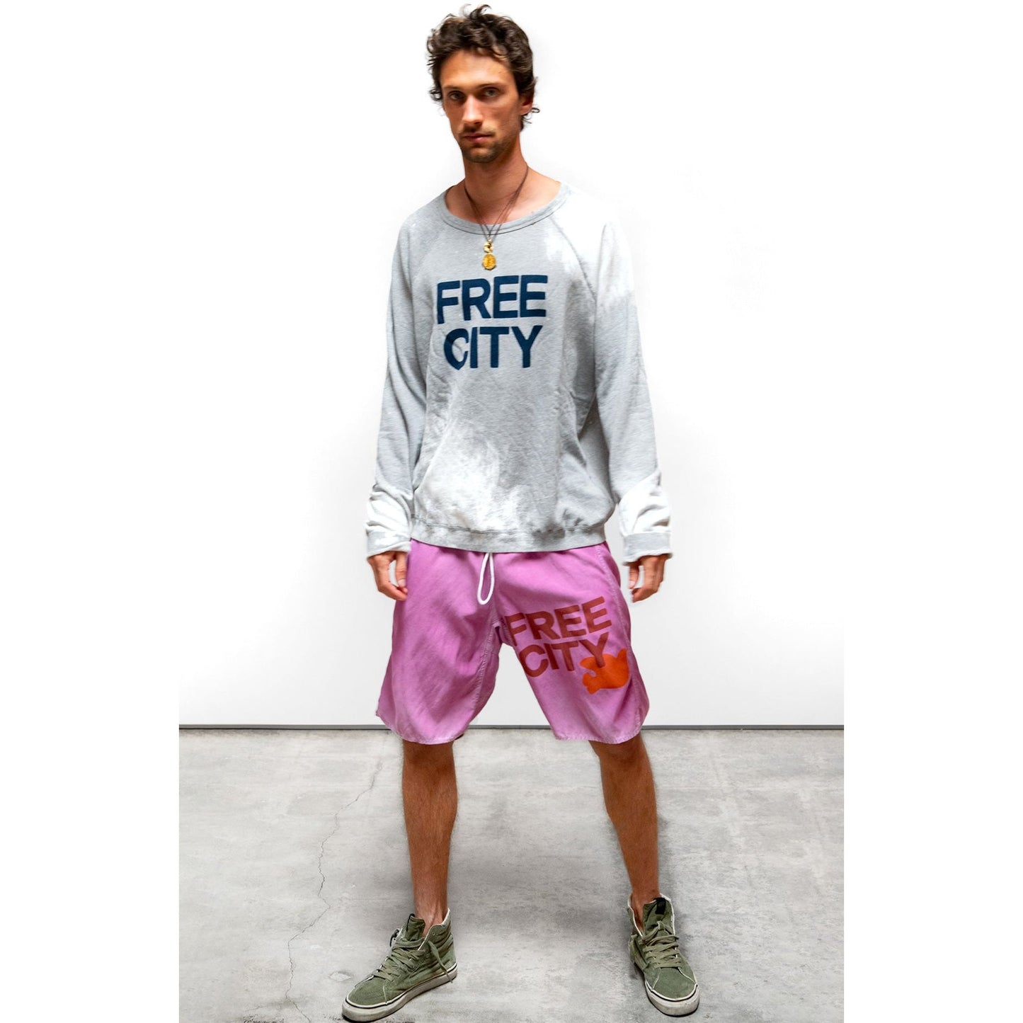 Women's Freecity matte satin back pocket shorts in Pinkshroom Powder, with a relaxed fit and stylish design.