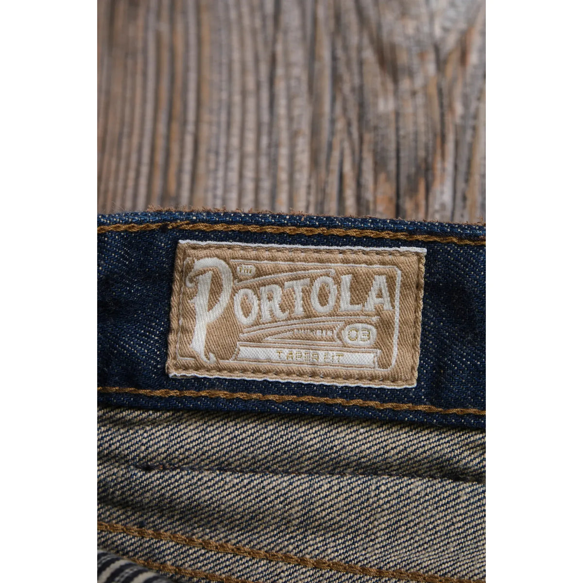 Men's Freenote Cloth Portola Classic Taper 13 oz denim jeans in natural rinse, showcasing the fit and textured fabric.