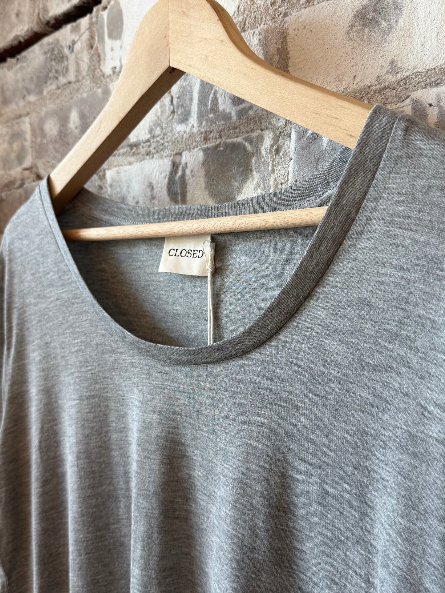 Light grey melange women's modal-cashmere longsleeve from Closed, soft and comfortable, displayed on a hanger against a neutral background.