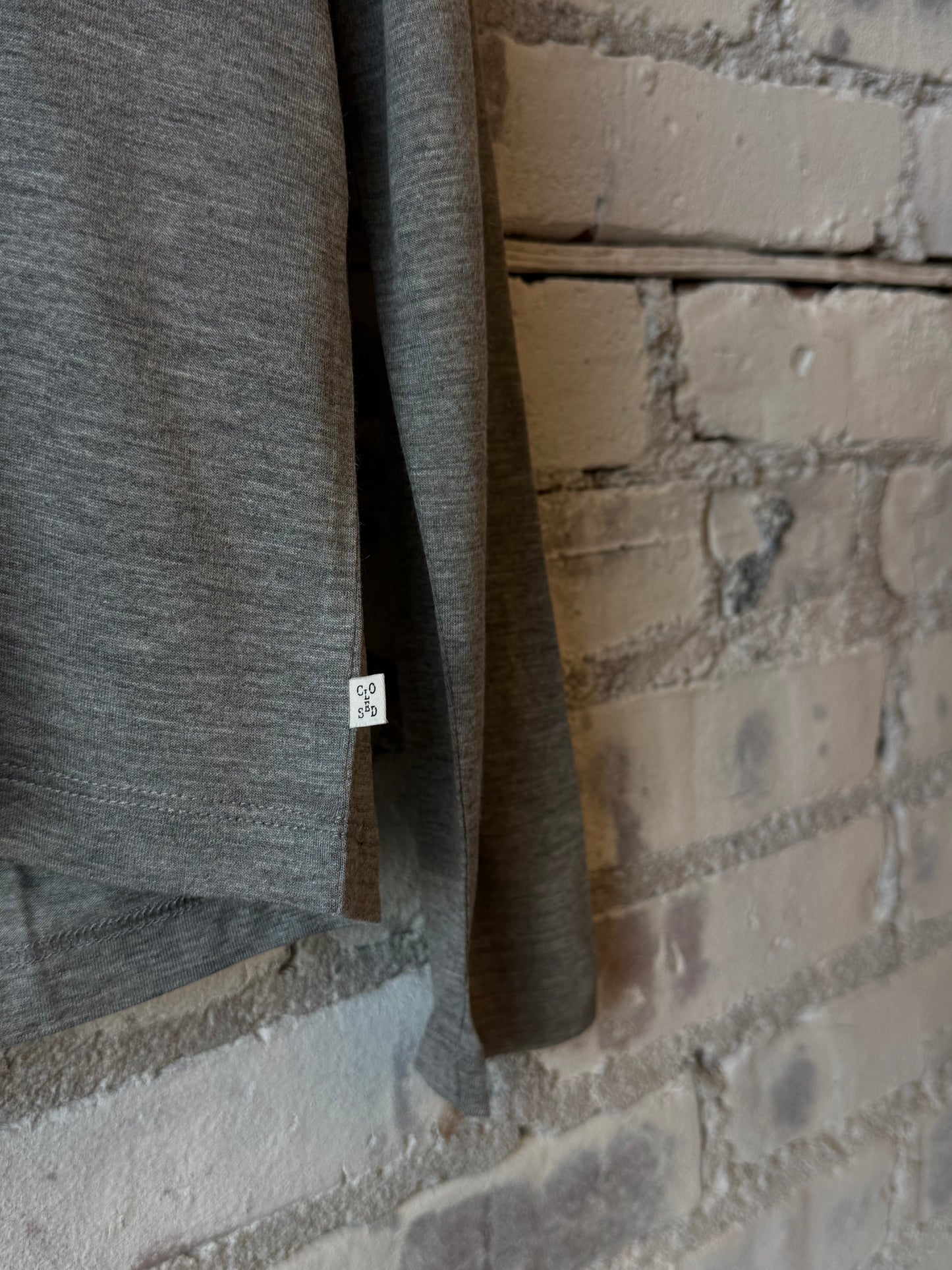 Light grey melange modal-cashmere long-sleeve women's top by Closed Women's, close-up of soft fabric and relaxed fit.