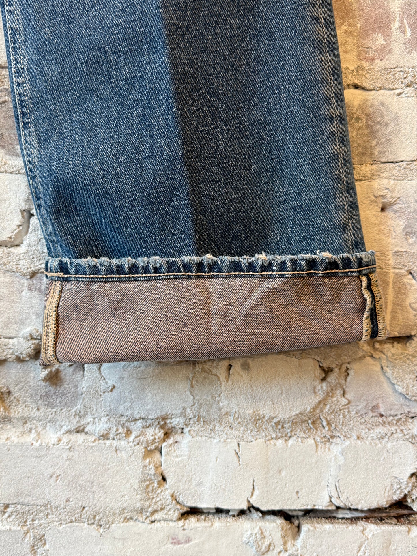 Closed Women's Gillan Comfort Wide Jean in mid blue, showcasing a relaxed fit with wide legs and classic denim details.