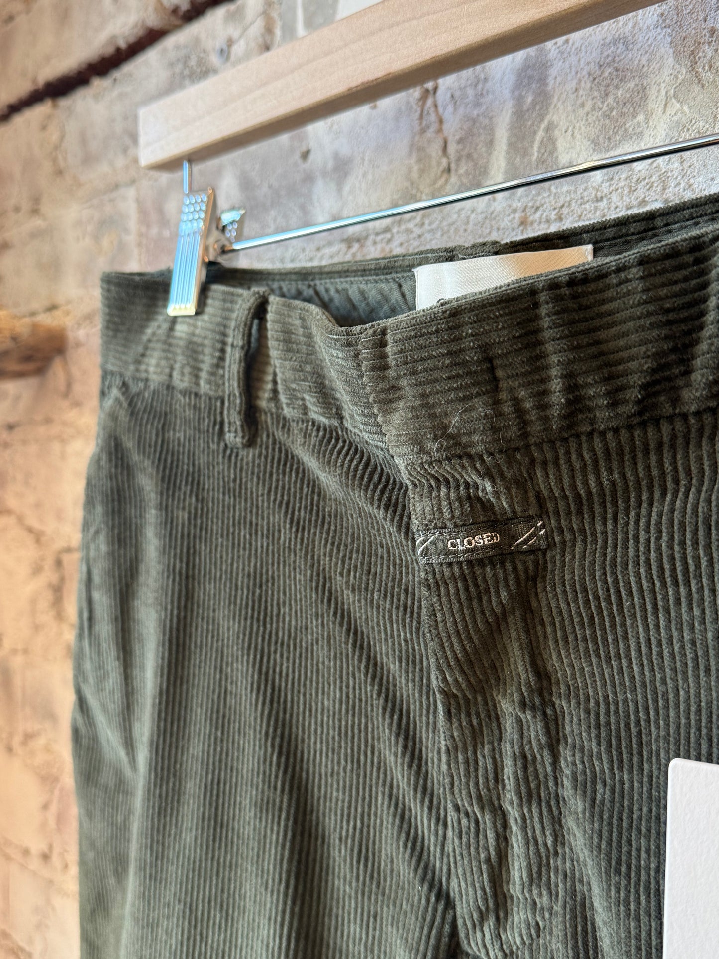 Men's Clifton True Corduroy Pants in dark olive green by Closed Men's, showing the textured fabric and classic fit.