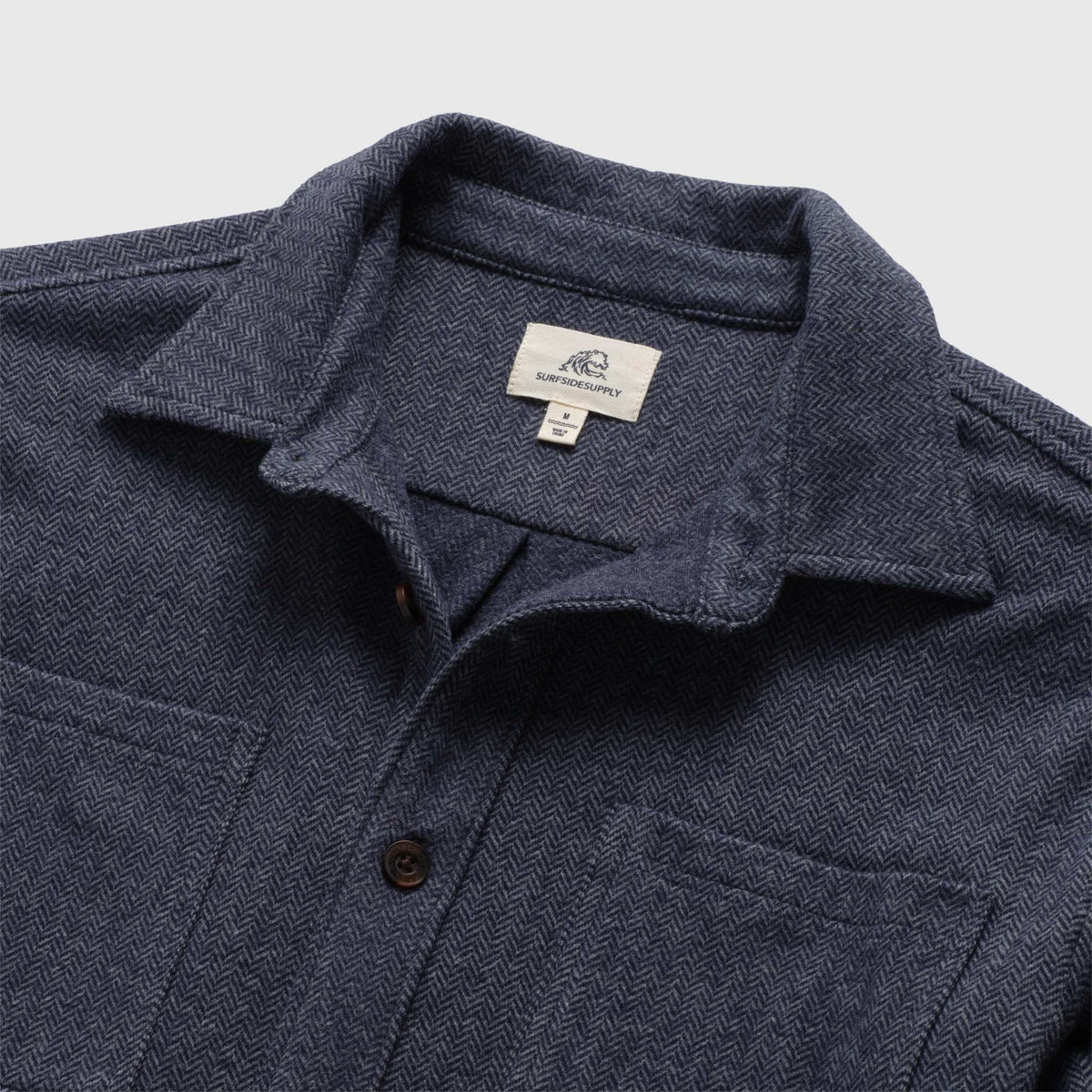 Men's navy Louis Soft Herringbone Overshirt by Surfside Supply, showing the textured herringbone fabric and classic collar design.