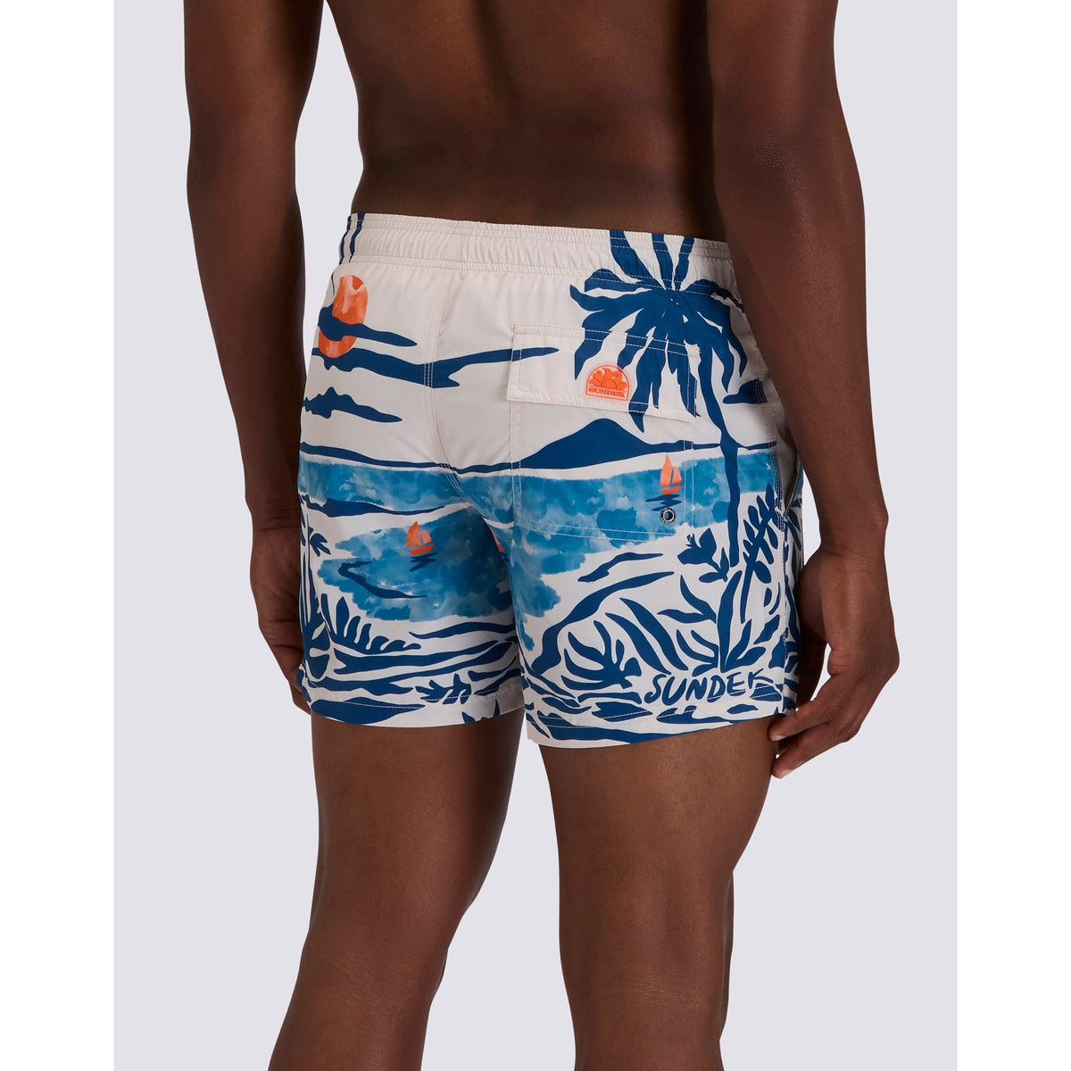 Men's Sundek elastic waist boardshort with multicolor nostalgic sea print made from recycled poly fabric, shown on model.