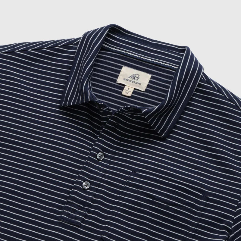 Men's navy and white striped polo shirt by Surfside Supply with a 4-button placket and chest pocket.