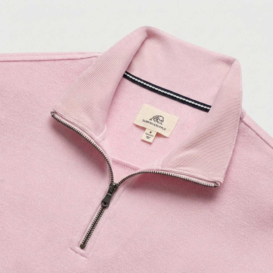 Men's pink heather fleece 1/4 zip pullover sweatshirt by Surfside Supply, featuring a navy and pink design.