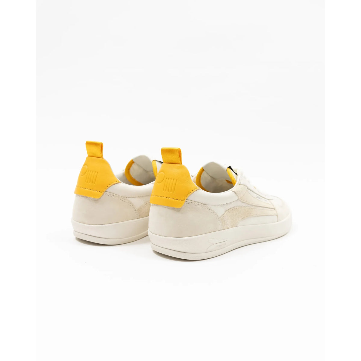 Oncept Fez men's vintage white sneaker with white laces and rubber sole, showcasing a casual, sporty design.