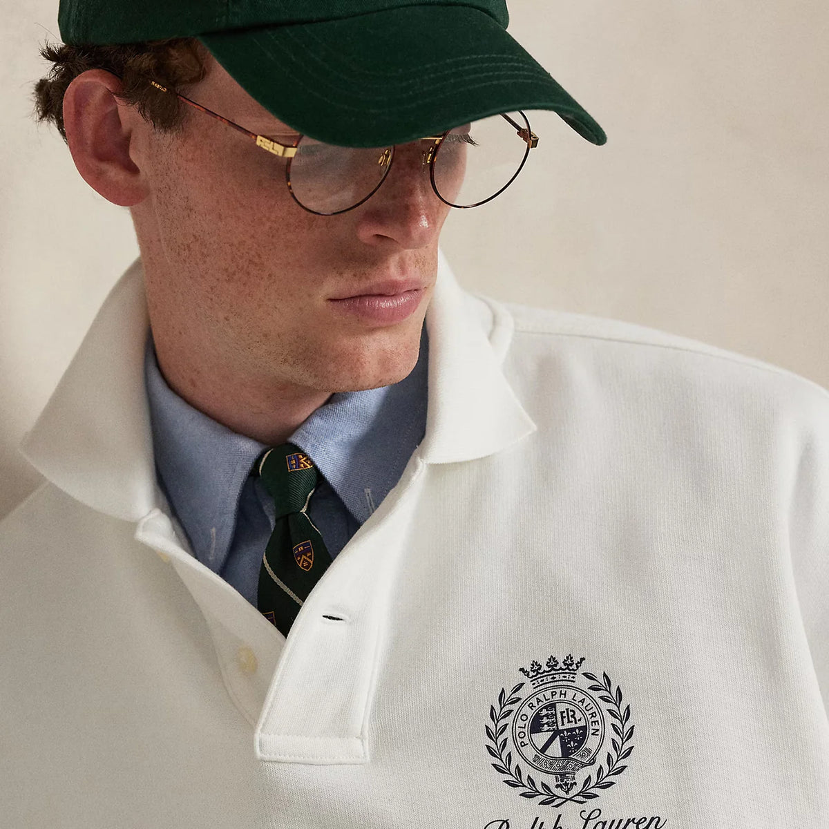 Men's white Polo Ralph Lauren Island Fleece graphic print polo sweatshirt with relaxed fit and ribbed cuffs.
