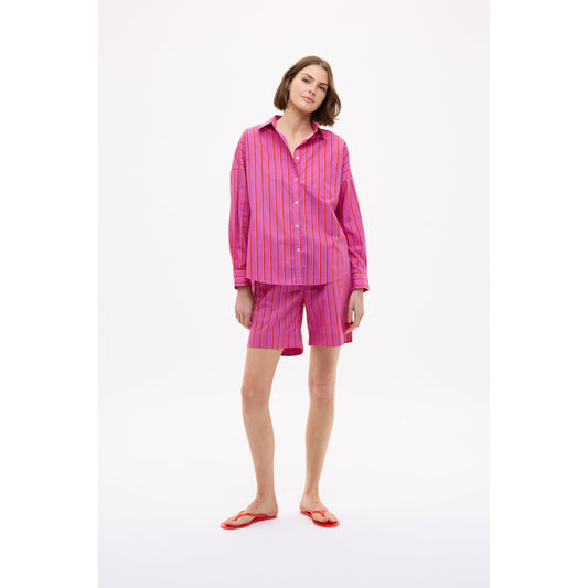 Women's Chiara Mid Length Short by LMND in Fuchsia, True Red, and Natural Stripe with a stylish, colorful striped pattern.