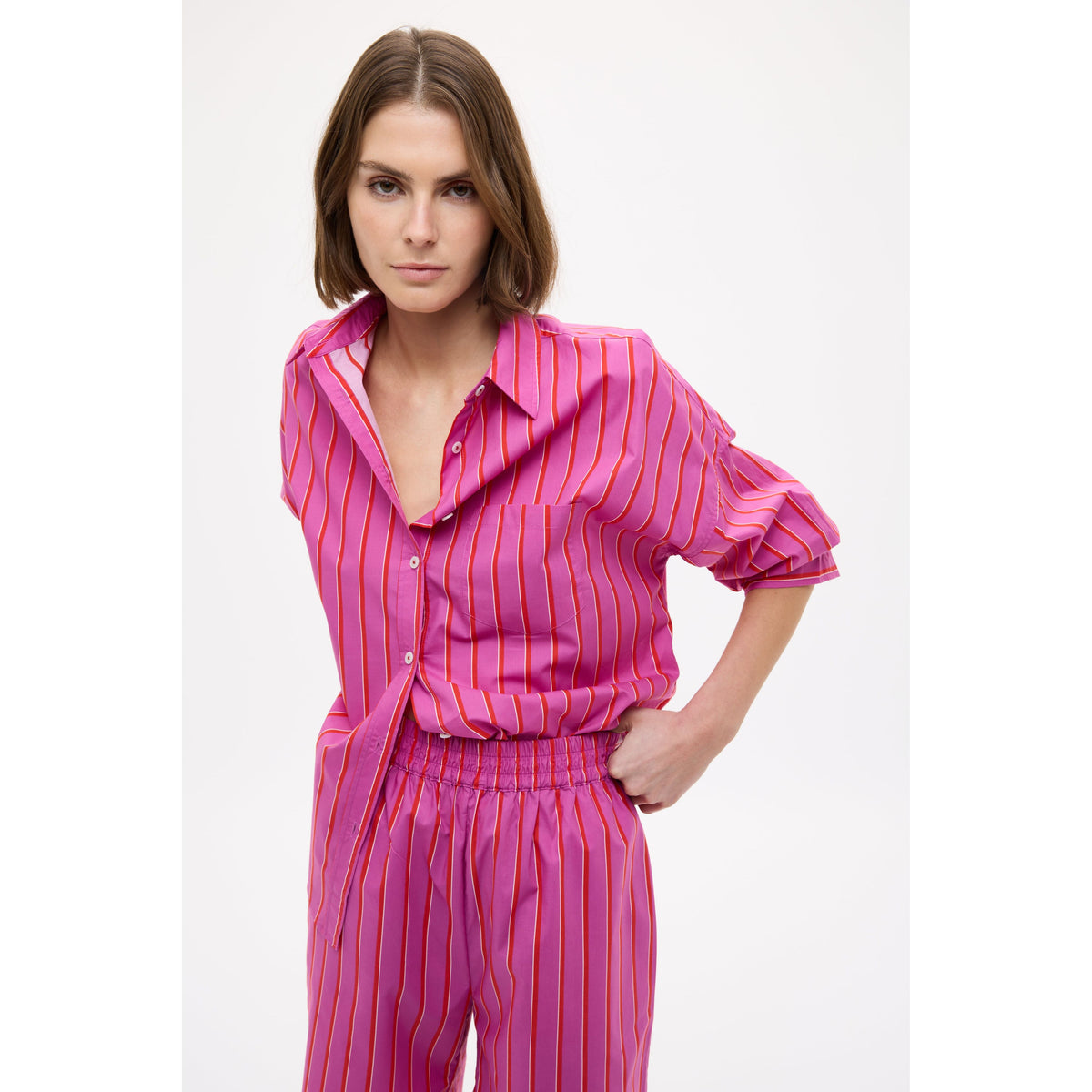 Women's Chiara Mid Length Short by LMND in fuchsia, true red, and natural stripe with a relaxed fit and casual style.