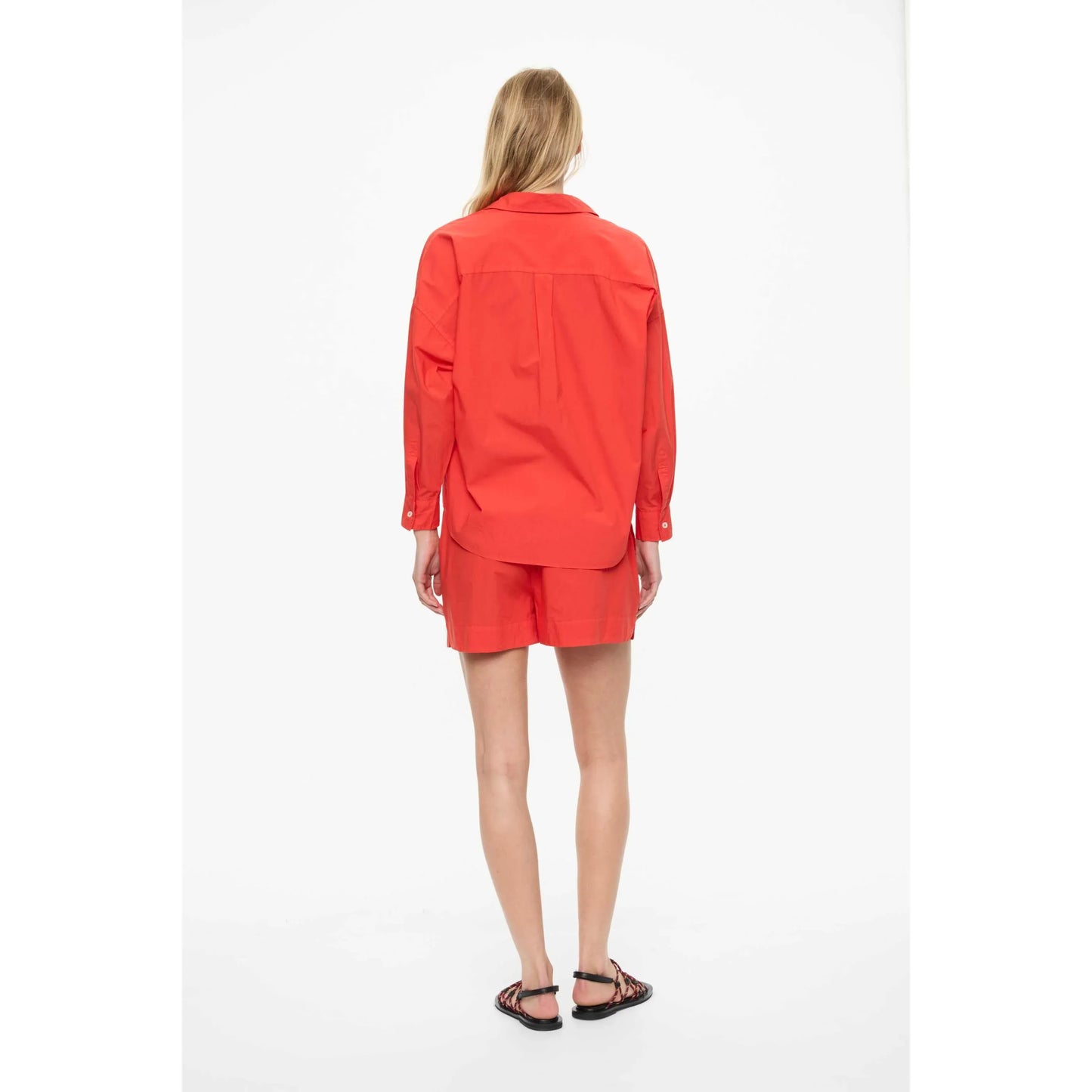 Women's Chiara Shorts in True Red by LMND, showcasing the vibrant, stylish fabric and fit perfect for casual wear.