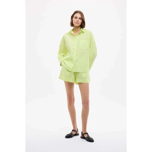 Women's Chiara Shirt in Sunny Lime by LMND, featuring a vibrant lime-green fabric with a relaxed fit and casual style.