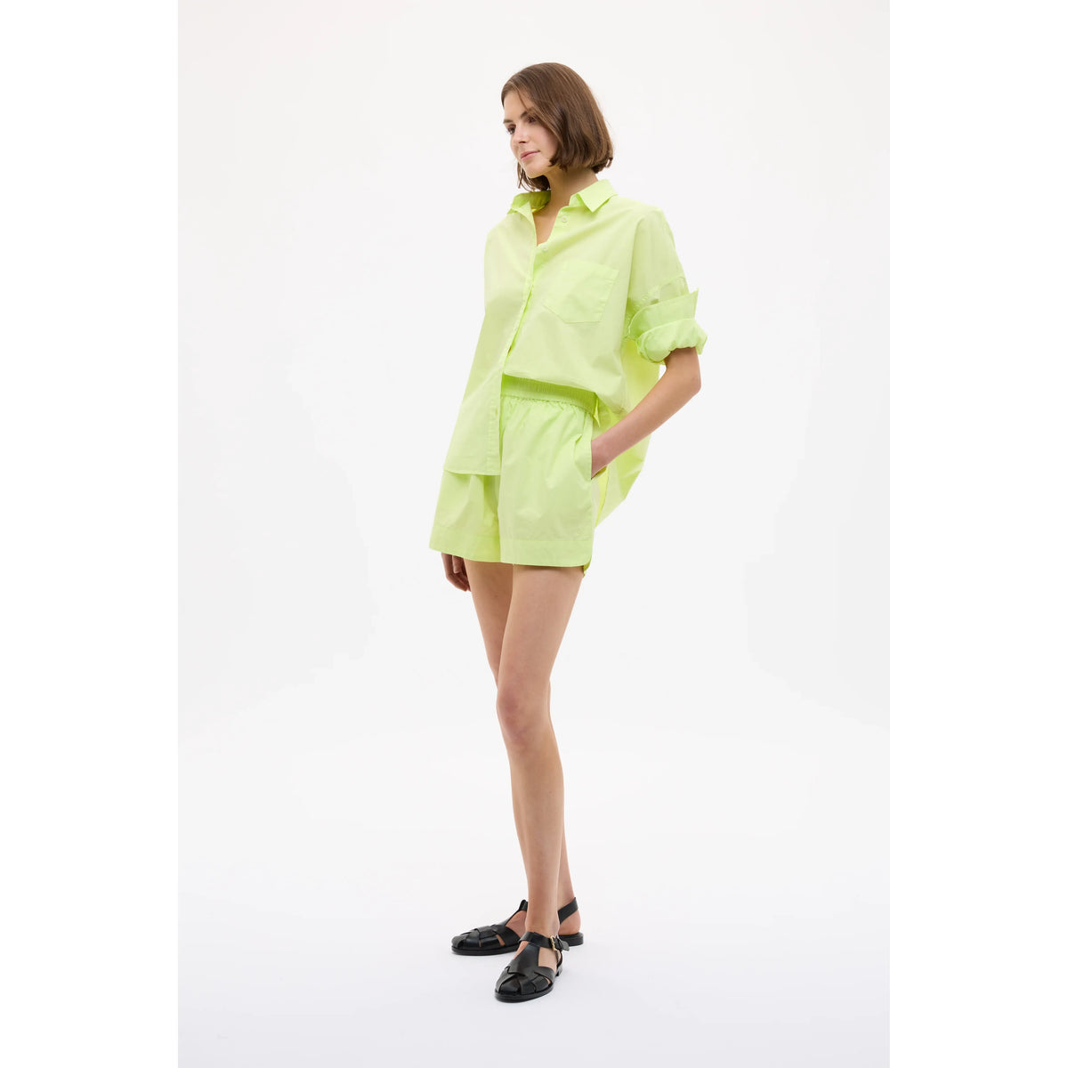 Women's Chiara Shorts in Sunny Lime by LMND, featuring a bright lime color and casual fit, styled for warm weather.