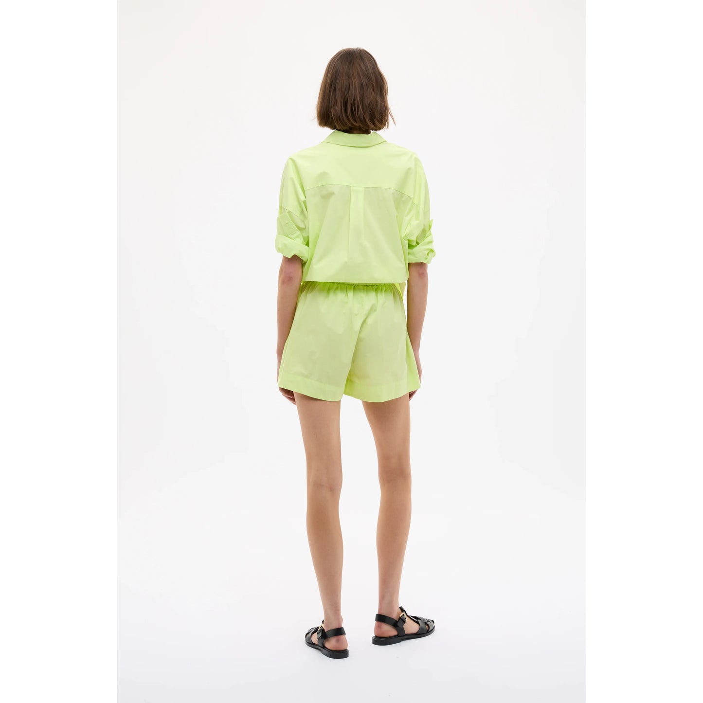 Women's Chiara Shorts in Sunny Lime by LMND, featuring a vibrant lime green color and casual fit, perfect for summer wear.