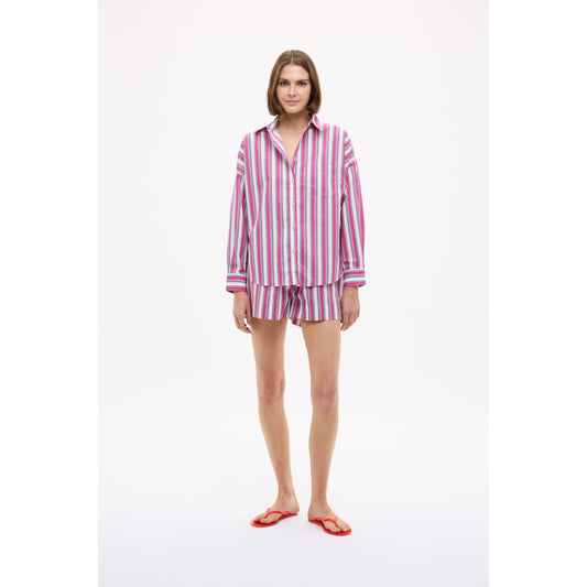 Women's Chiara Mid Length Shorts in Fuchsia Multi Stripe by LMND, featuring vibrant striped fabric and a relaxed fit.