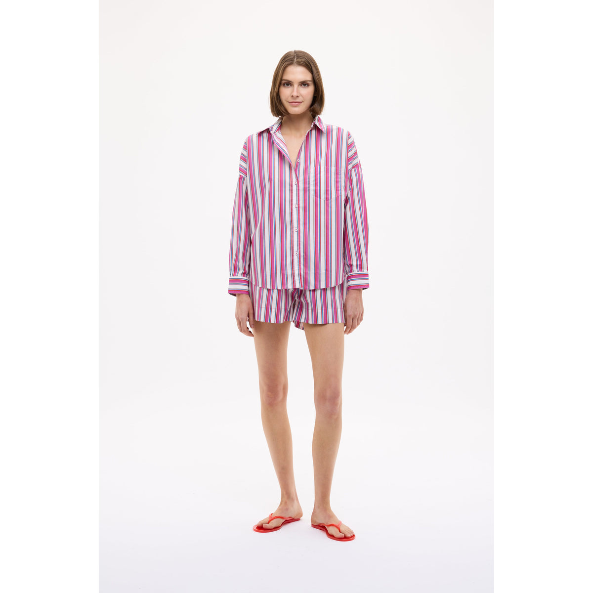 Women's Chiara Mid Length Shorts in Fuchsia Multi Stripe by LMND, featuring vibrant striped fabric and a relaxed fit.