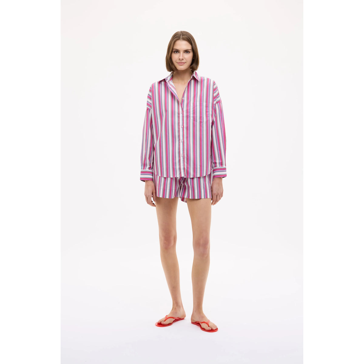 Women's Chiara Long Sleeve Shirt in fuchsia multi-stripe by LMND, featuring vibrant horizontal stripes and a relaxed fit.