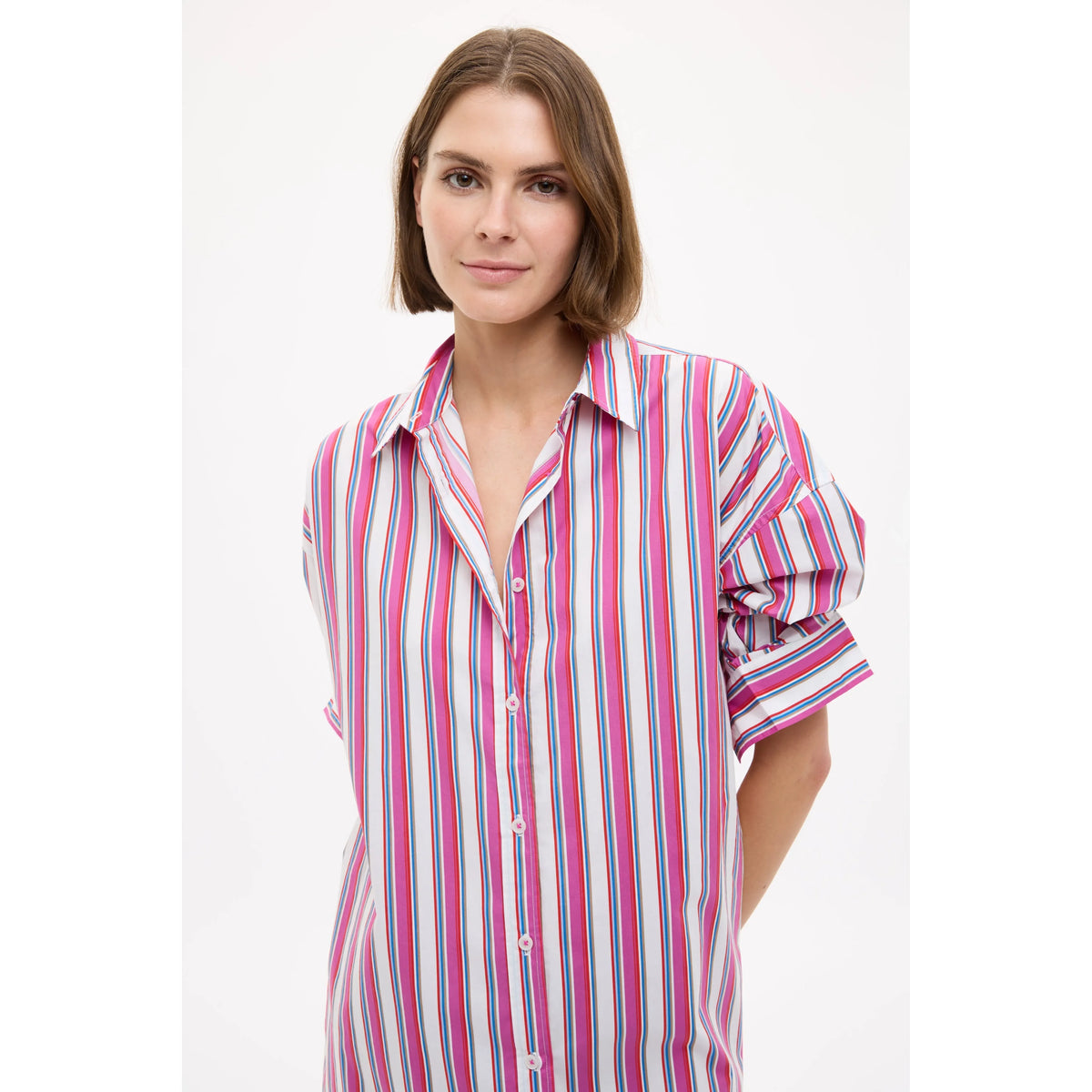 Women's Chiara Midi Dress by LMND in fuchsia multi stripe, featuring a flowing silhouette and vibrant pattern.