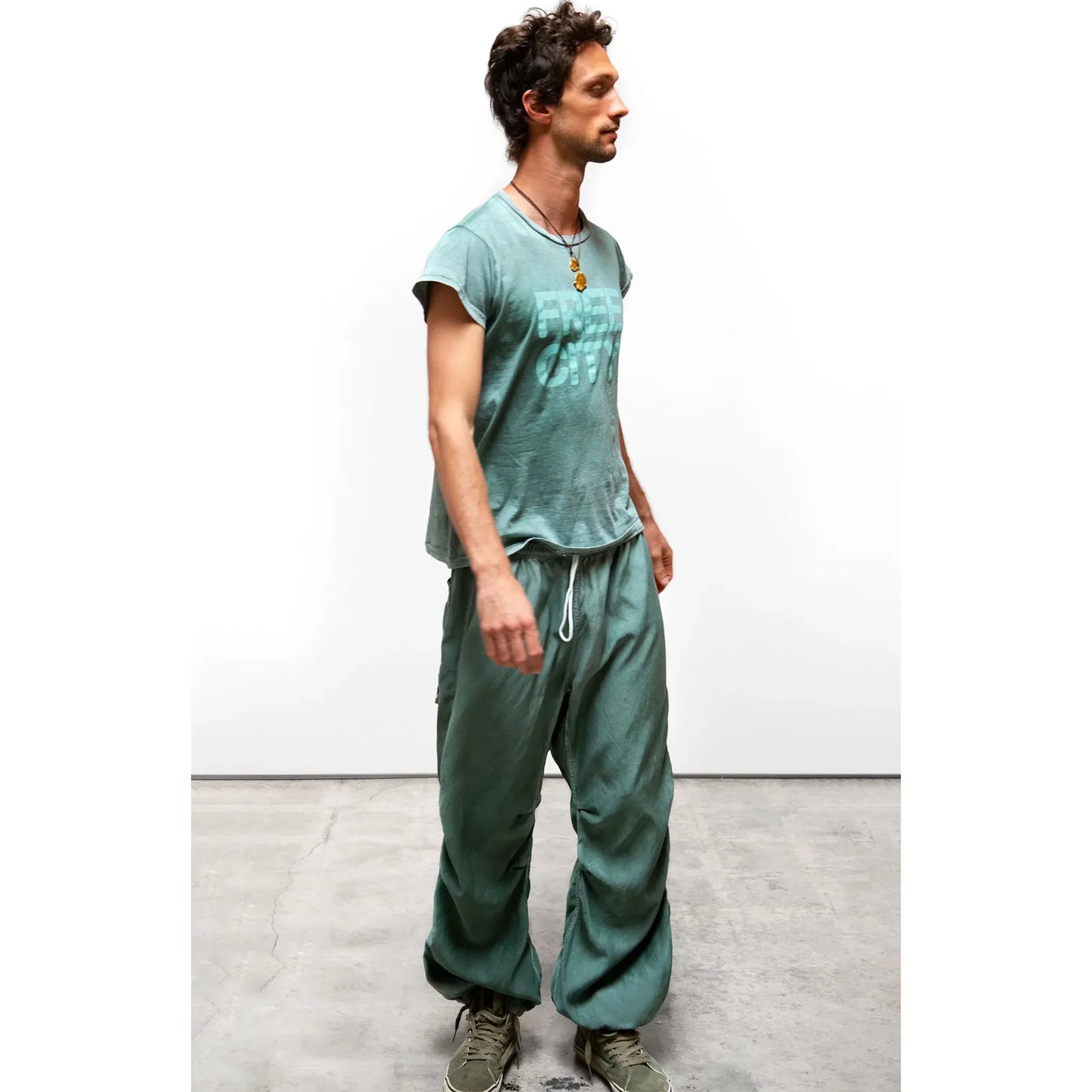 Women's Freecity matte and satin loose drawcord Biggy pants in spring look with relaxed fit and stylish design.
