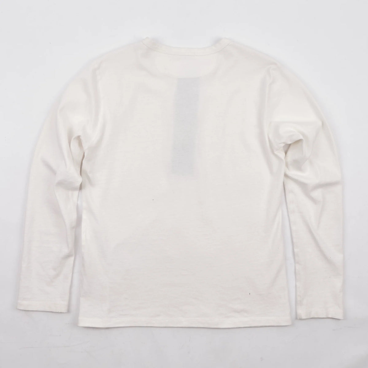 Men's white 13-ounce long-sleeve Henley shirt by Freenote Cloth, featuring a classic fit and buttoned neckline.
