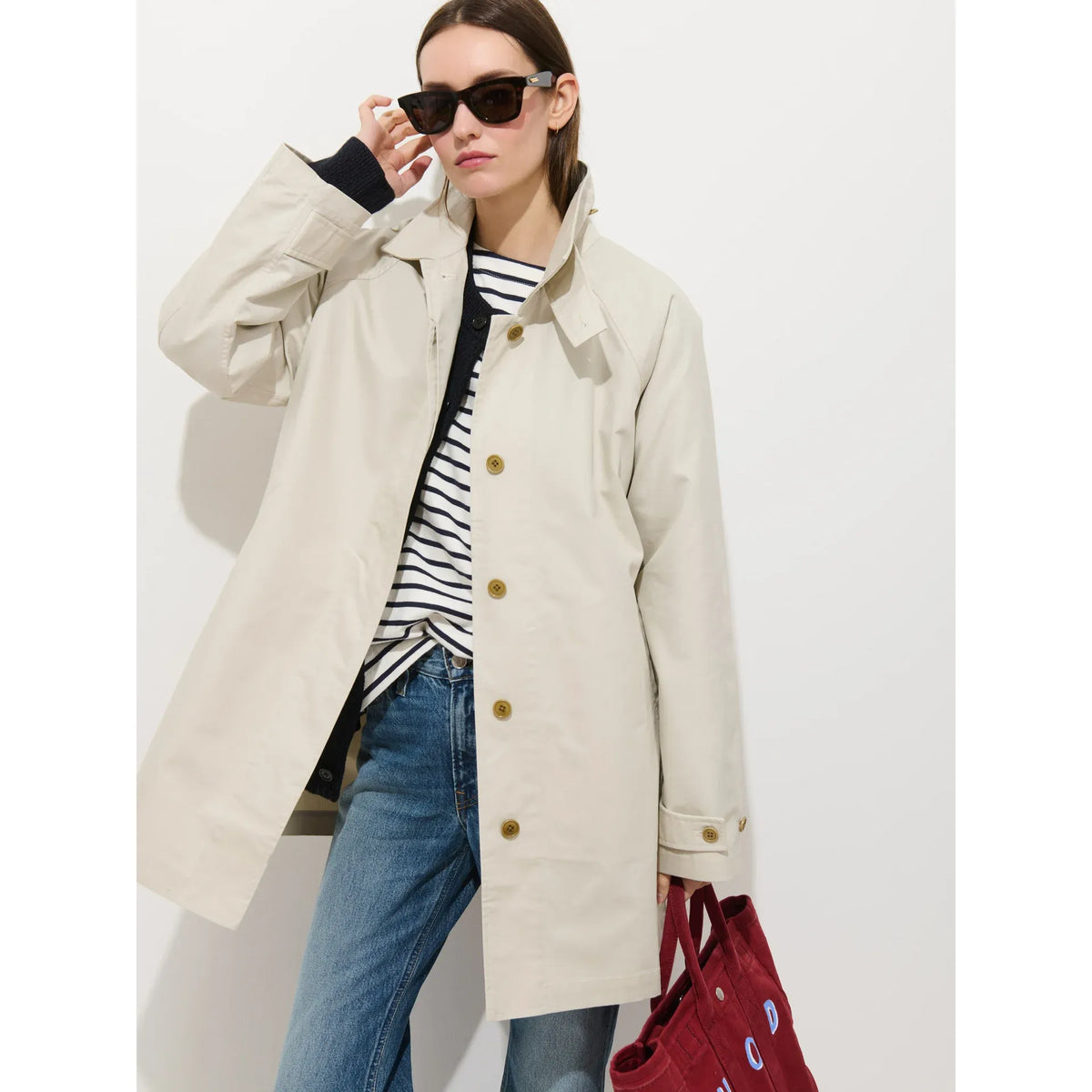 Women's Madeleine Trench in cotton blend by Alex Mill, stone color, front view showing classic trench coat design.