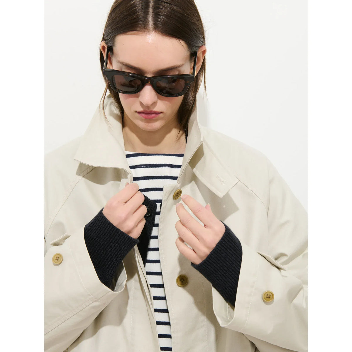 Women's Madeleine Trench Coat in cotton blend by Alex Mill, stone color, front view showing tailored design and button details.
