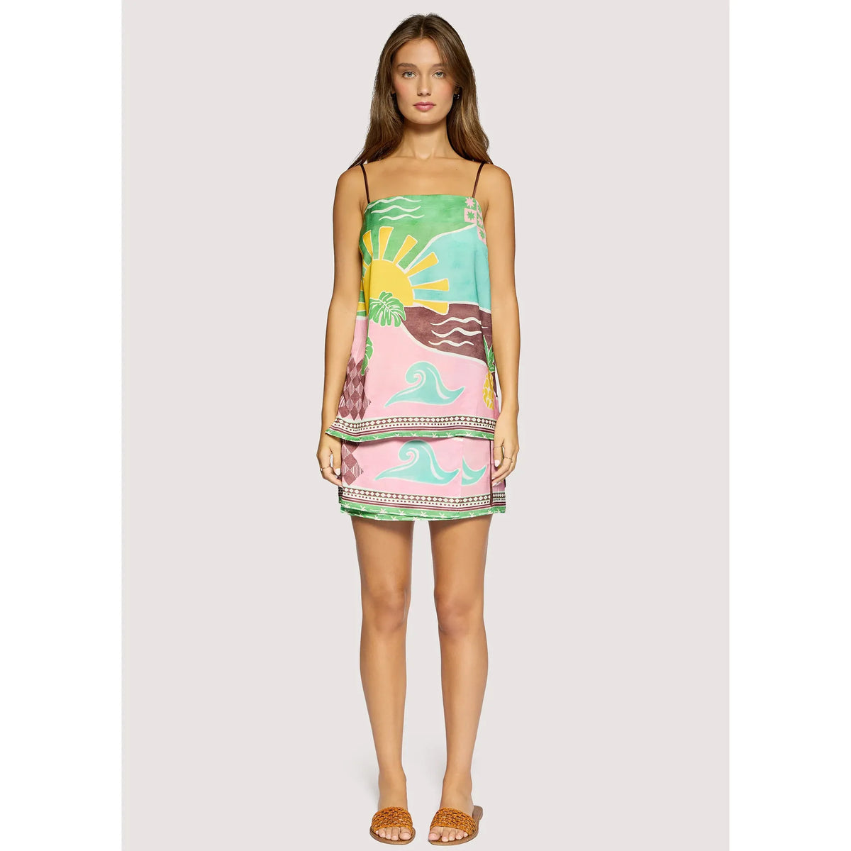 Women's Isla Spell Mini Skirt in green multi by Lost + Wander, featuring a vibrant, patterned design on lightweight fabric.