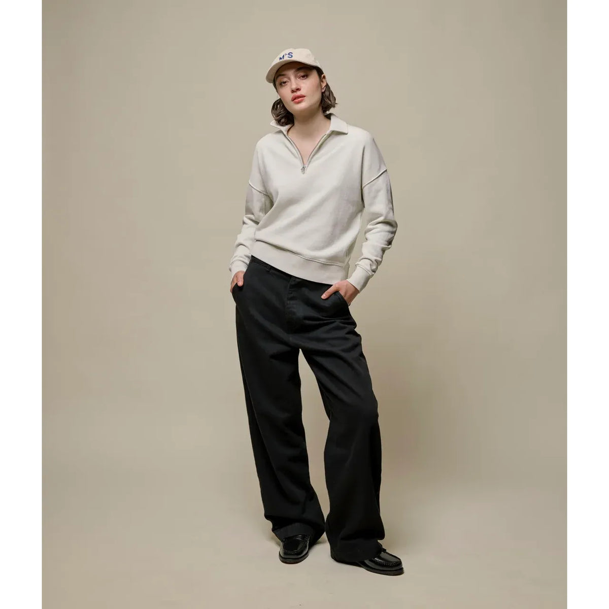 Merz b. Schwanen women's cropped retro fleece half-zip sweatshirt in cashew, showing the fleece fabric and half-zip front detail.