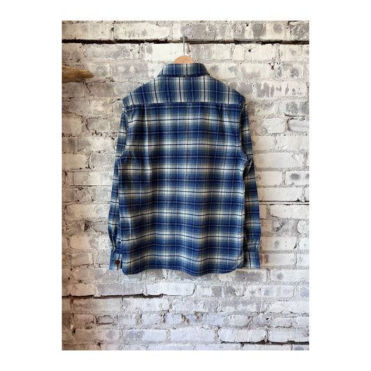 Men's Ace Rivington utility winter flannel in storm blue, featuring a warm, durable plaid fabric for cold weather wear.
