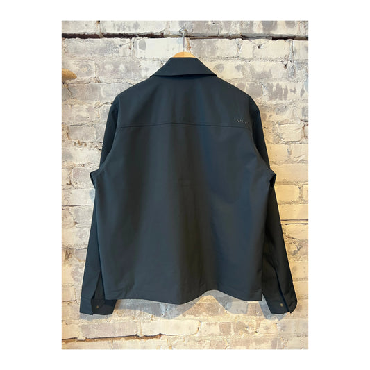 Men's navy blue Alban Technical Jacket by NN07, featuring a sleek design and technical fabric, suitable for outdoor wear.
