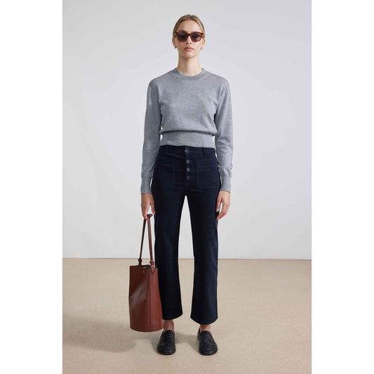 Women's Marston Slim Corduroy Pant by Apiece Apart in midnight blue, shown in a full-length view with a focus on fit and fabric texture.