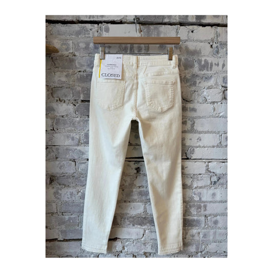 Close-up of Closed Women's Baker Power Stretch Skinny Jeans in ivory, showcasing the fitted style and soft denim fabric.