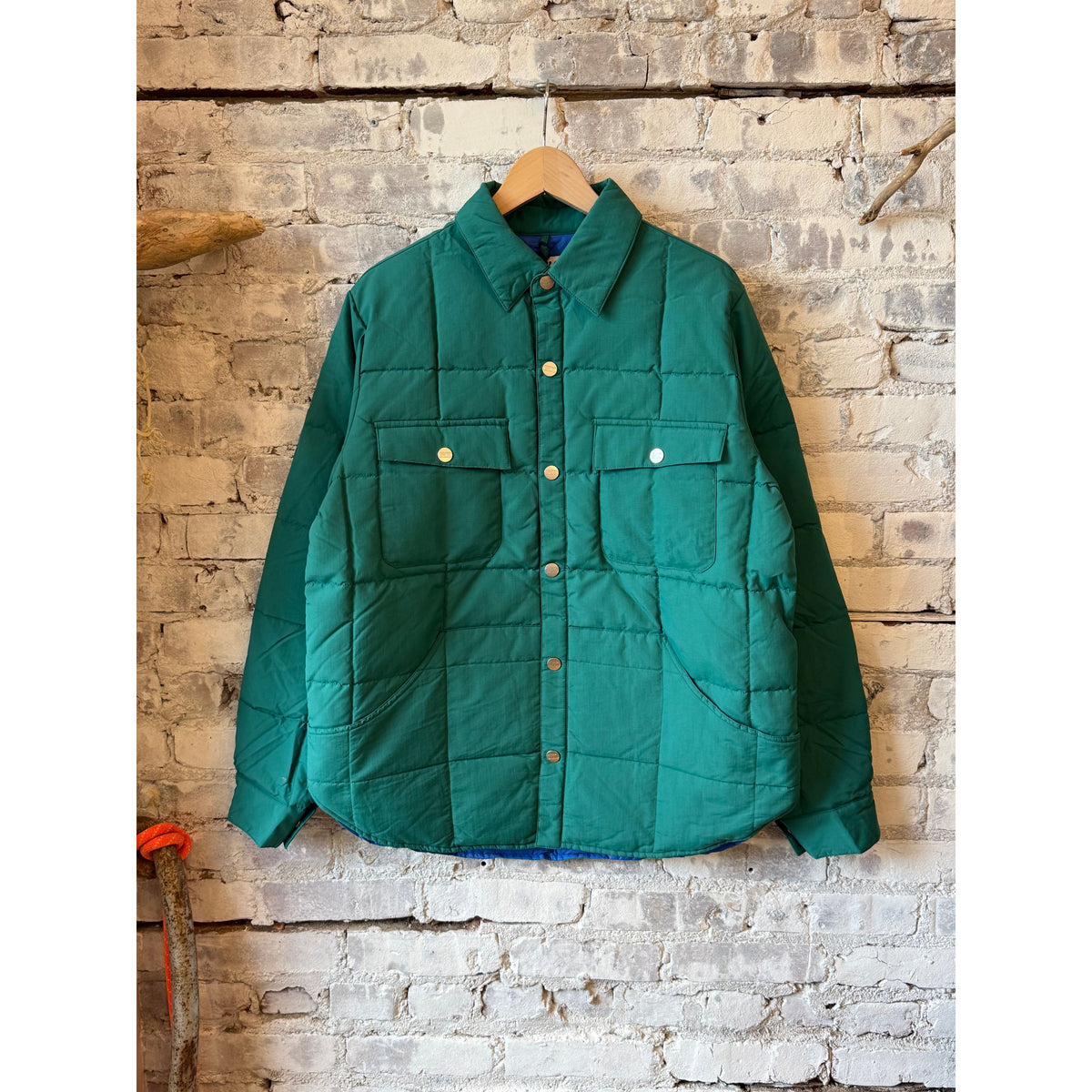 Men's Bridalveil Jacket in spearmint by Big Rock Candy Mountaineering, shown in a stylish outdoor setting.