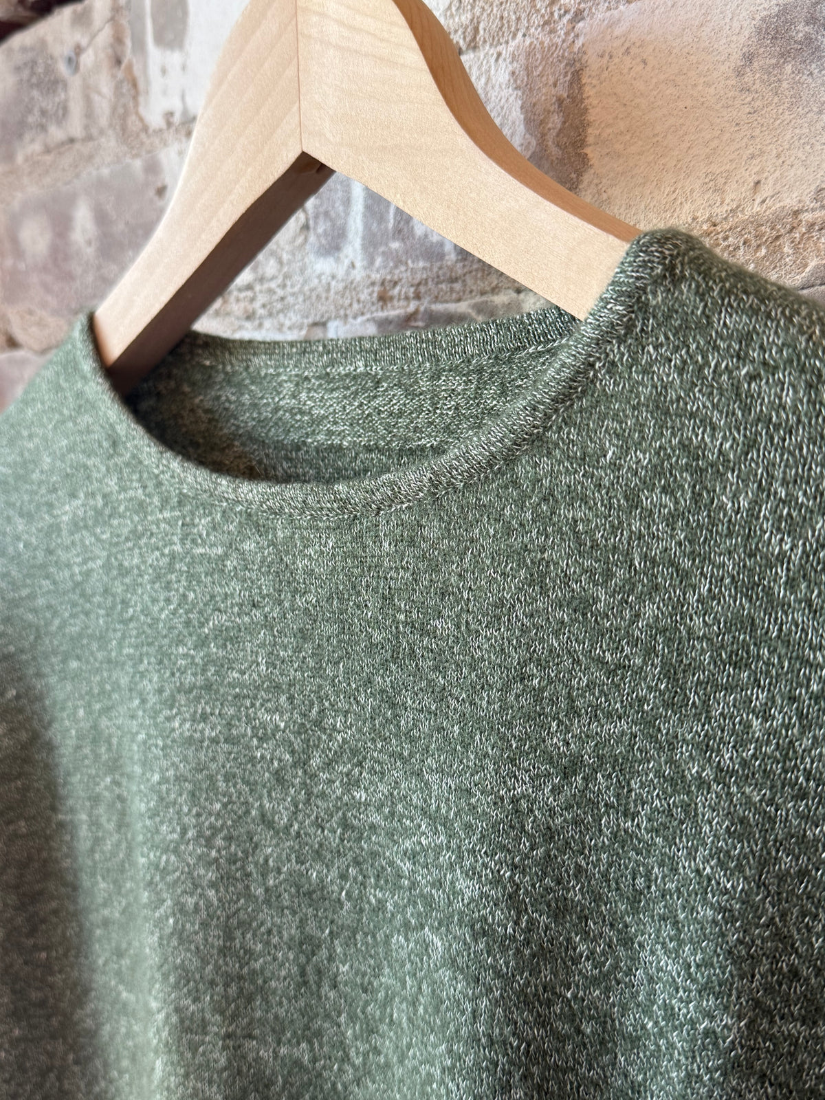 Women's olive green cashmere linen knit long sleeve crew top by V::Room, showcasing soft fabric and relaxed fit.