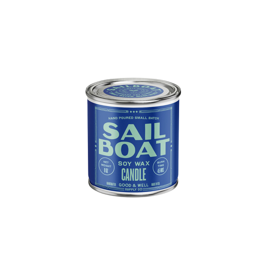 Sailboat soy candle by Good & Well Supply Co., designed as a home accessory with a sailboat motif, in a glass jar.