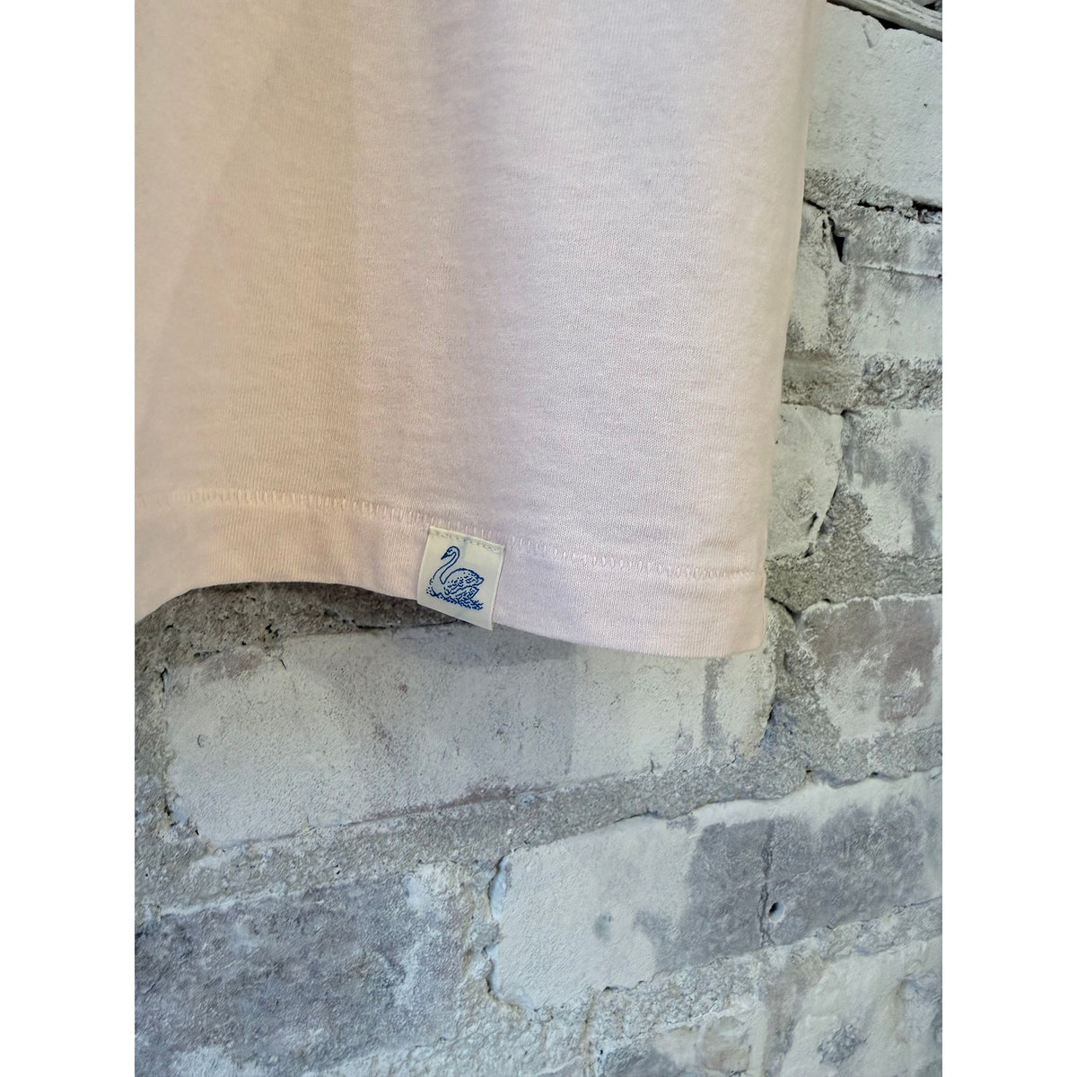 Men's Merz B. Schwanen classic cotton jersey short sleeve polo shirt in shell color, showcasing the relaxed fit and breathable fabric.
