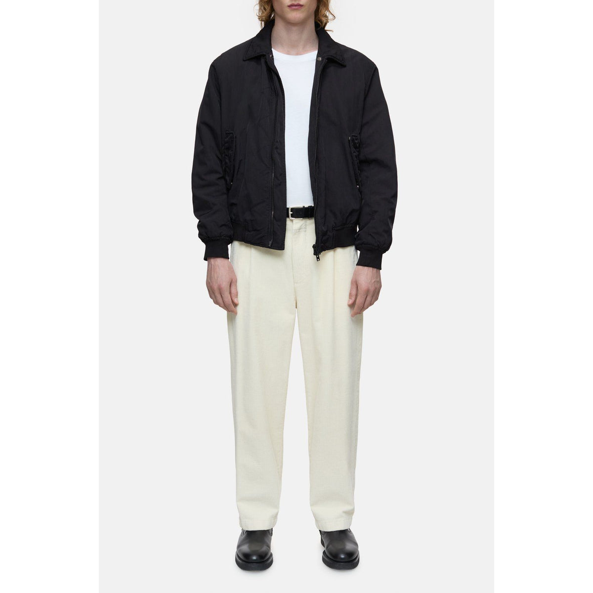 Men's nylon flight jacket by Closed in ebony, featuring a sleek design with a zip-up front and ribbed cuffs.