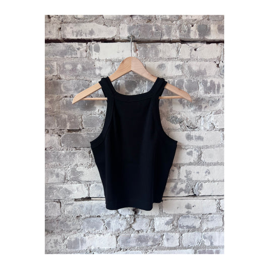 Black women's Cropped Racer Top by Closed Women's, close-up view showing fitted design and soft fabric details.