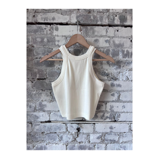 Women's ivory cropped racer top by Closed, featuring a fitted sleeveless design and athletic-inspired style.